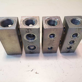 Hydrauliikan jakotukki 9-paikkainen